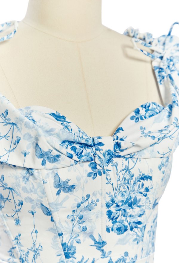 Vestido retro de los años 50 con estampado de flores hombros al aire y cinturón Vestido retro de los años 50 con estampado de flores hombros al aire y cinturón