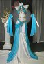 Disfraz de Cosplay Conjunto de Lencería Derivado de la Princesa Zelda, Sostén con Cuello y Braguita Triangular junto con Medias de los Muslos y Falda de Gasa