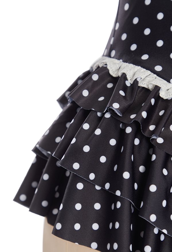 Traje de baño de una pieza estilo vintage con lunares negros cuello halter y falda con volantes Traje de baño de una pieza estilo vintage con lunares negros cuello halter y falda con volantes