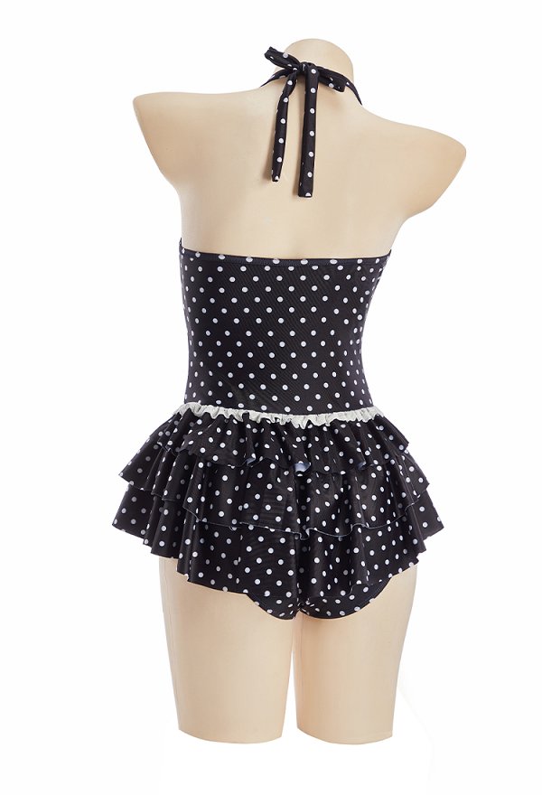 Traje de baño de una pieza estilo vintage con lunares negros cuello halter y falda con volantes Traje de baño de una pieza estilo vintage con lunares negros cuello halter y falda con volantes