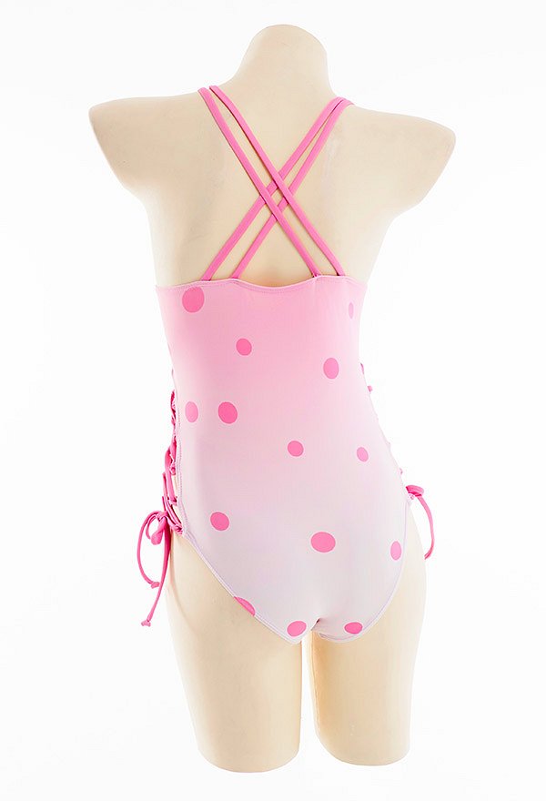 Bañador de una pieza rosa con lunares azul con cordones escote en V profundo espalda cruzada y sin espalda Bañador de una pieza rosa con lunares azul con cordones escote en V profundo espalda cruzada y sin espalda